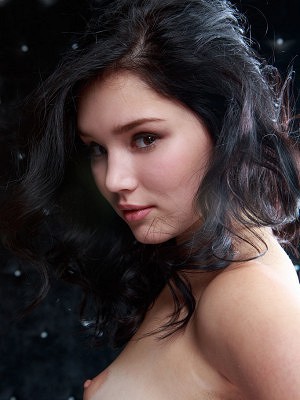 "Raven-haired Malena poses in...